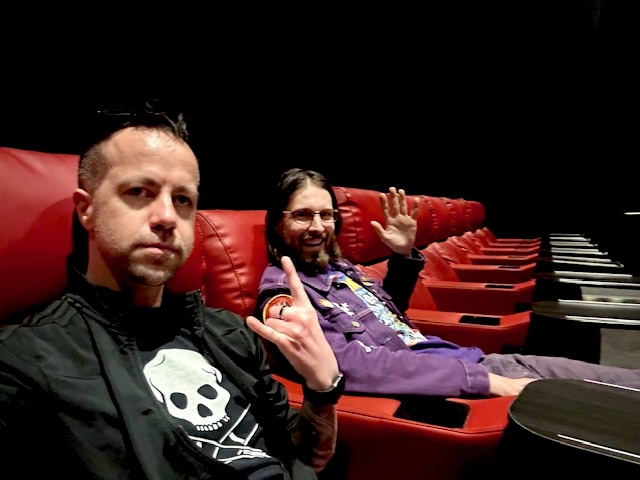 Chris and Danny seated inside the Regal North Hollywood auditorium (second photo)
