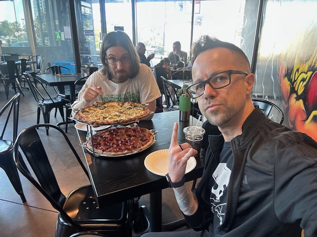 Danny and Chris with pizza at Ozzy’s Apizza
