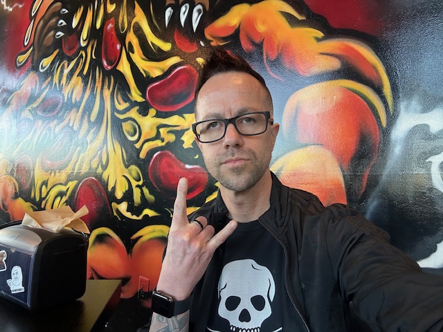 Danny inside Ozzy’s Apizza interior