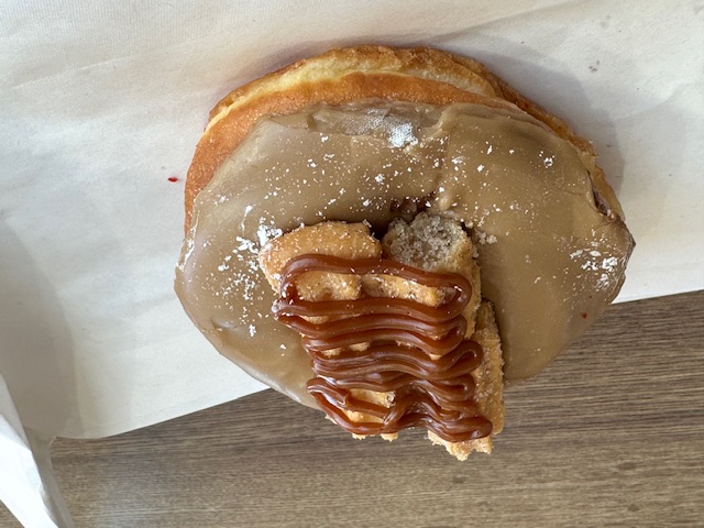 Raised maple donut with churros from Randy’s Donuts