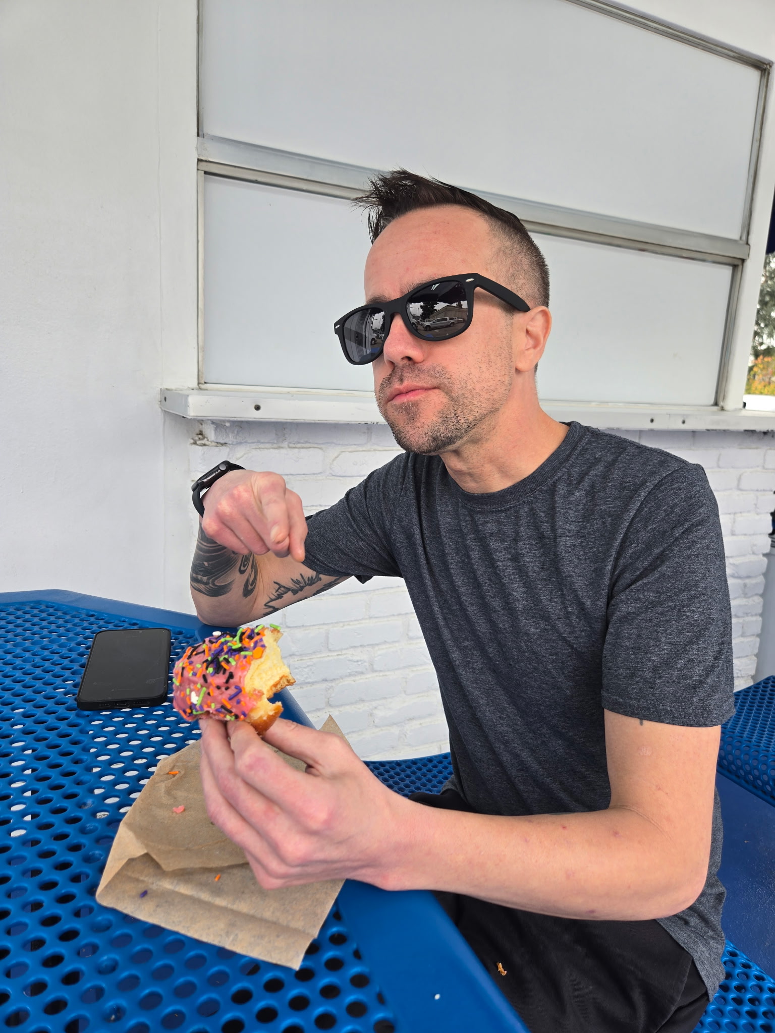 Danny (me) finishes devouring a giant donut from Rolling Pin.